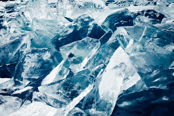 Blocks of ice gleaming in the sun. Arctic winter background.