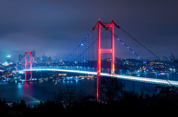 Fototapeta na wymiar Istanbul Bosphorus Bridge at night. 15th July Martyrs Bridge (15 Temmuz Sehitler Koprusu). Istanbul, Turkey..