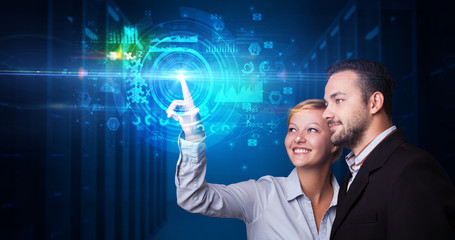 Man and woman touching hologram screen displaying medical symbols and charts
