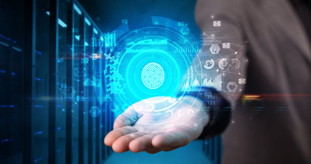 Man holding hologram projection displaying biometric security concept
