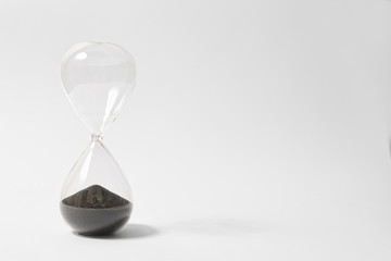 Hourglass On White Background Showing Time's Up, Countdown Is Over,The End