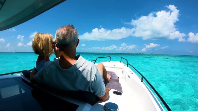Active senior travellers sailing on luxury yacht Bahamas