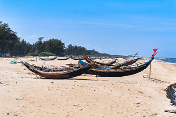 Fototapeta na wymiar Hai Tien Beach fisherman boats, Hue, Vietnam