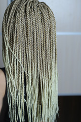 african braids person, looking