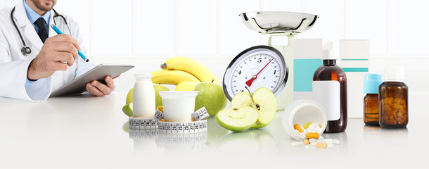 dietitian nutritionist doctor prescribes prescription at the desk office with apple, yogurt,...