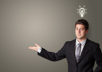 Young smiling person presenting new idea concept
