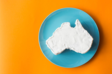 vanilla cream cake in a shape of the Australia - Happy Australia Day message greeting card
