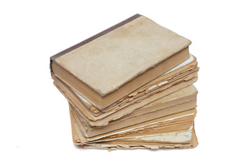 Stack of aged books isolated on a white background.