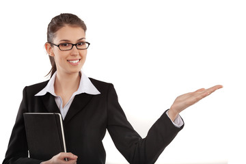 Young beautiful businesswoman or assistant gesturing and holding notebook note pad