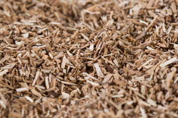 pieces of wood chip smoking element giving flavor and taste many elements pattern natural beige.