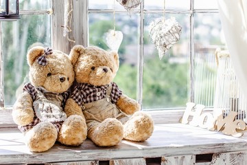 Teddy bears on the window