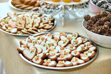 candy bar decorated by delicious sweet buffet with cupcakes and other desserts/candies,happy birthday concept