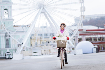 Full length photo of delighted girl that sitting on bike