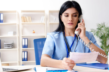 Female doctor cardiologist working in the clinic