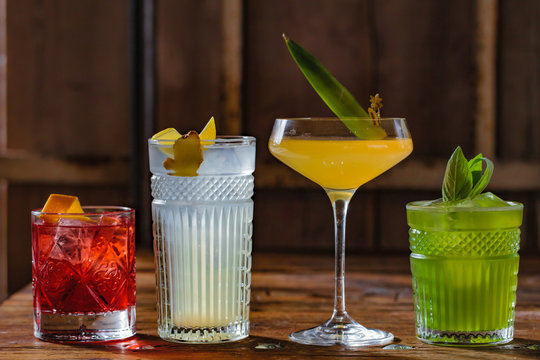 Image of colorfull coctails in the bar, mixology concept