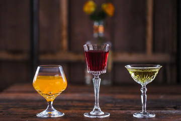 Image of colorfull coctails in the bar, mixology concept