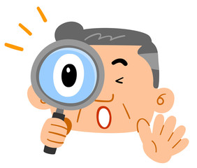 虫眼鏡を覗いて驚く中年男性
