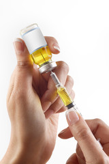 hand preparing  syringe