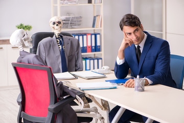 Funny business meeting with boss and skeletons