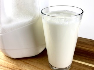 Glass of milk with jug