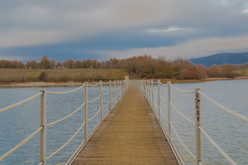 Fototapeta premium taking a walk on the footbridge of the marsh of Ullibarri Gamboa