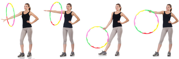 Young woman with hula hoop isolated on white 