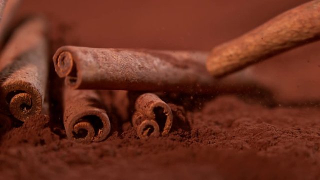 Falling cinnamon into powder in super slow motion.