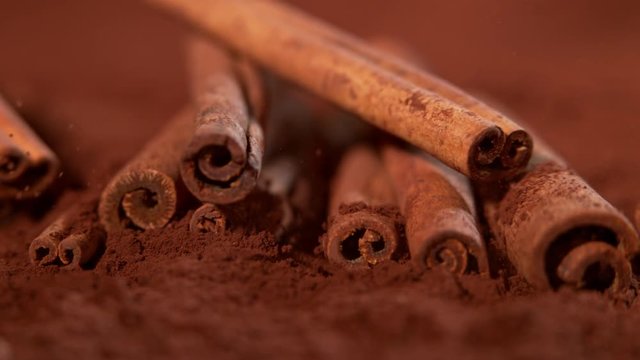 Falling cinnamon into powder in super slow motion.
