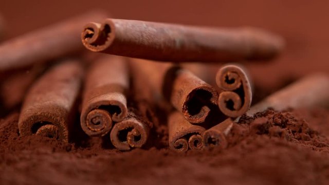Falling cinnamon into powder in super slow motion.