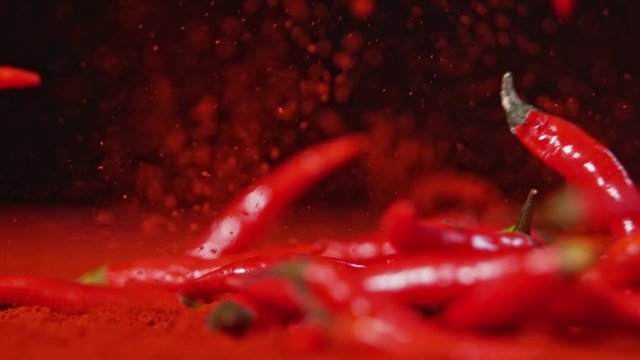 Falling chilli peppers into powder in super slow motion.