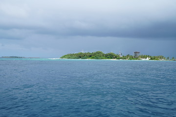 View of an island in the Maldives during monsoon season