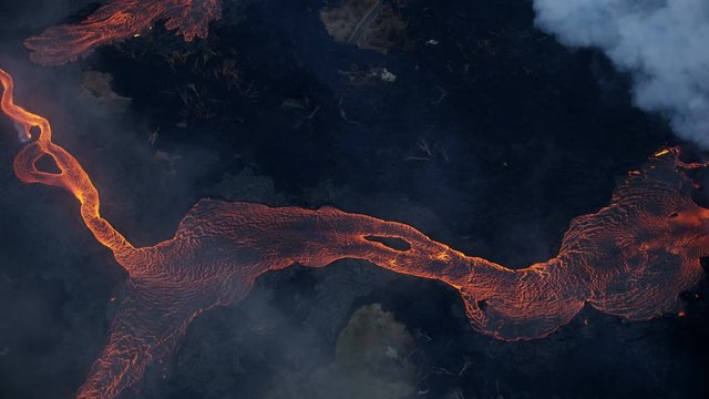 Aerial view of red hot volcanic magma flowing