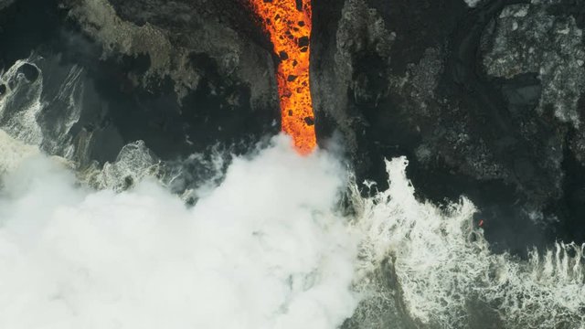 Aerial view red hot magma ocean steam rising
