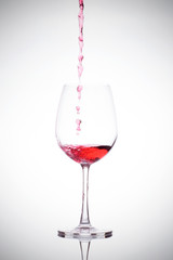 Wineglass and red wine
