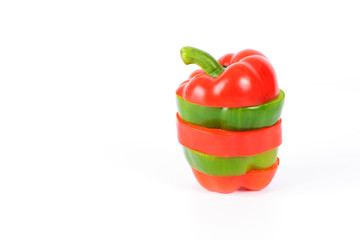 Mixed peppers sliced in stack Isolated on white backgrouund