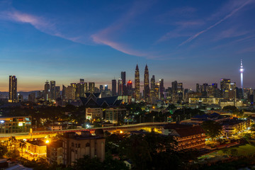 Fototapeta na wymiar KUALA LUMPUR, MALAYSIA - 13th JAN 2019; Majestic sunrise over downtown Kuala Lumpur, Malaysia. 