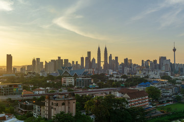 Fototapeta na wymiar KUALA LUMPUR, MALAYSIA - 13th JAN 2019; Majestic sunrise over downtown Kuala Lumpur, Malaysia. 