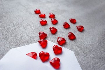 envelope with red crystal hearts