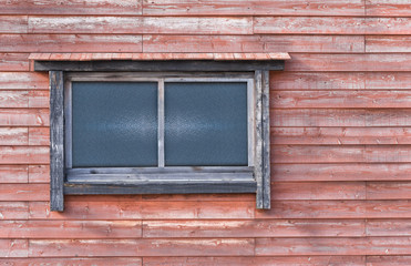 wooden and  glass window in the redwood wall - Image