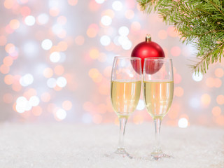 Glasses of champagne with Christmas decorations. Holidays background with copy space for your text