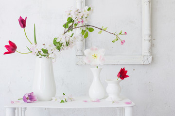 beautiful spring flowers on background white wall