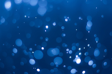 abstract deep blue background with blur bokeh light effect