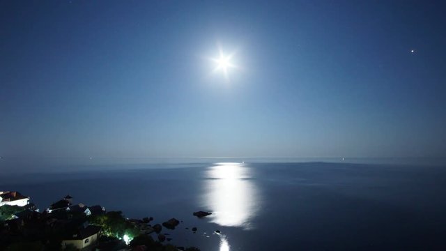 night's moonrise over the Black Sea Bay in foros