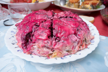 salad herring under a fur coat on the table