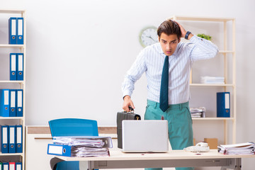 Businessman disgusted with cockroaches in the office