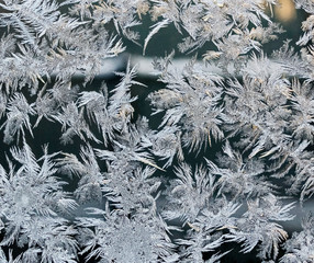 beautiful frosty patterns on glass