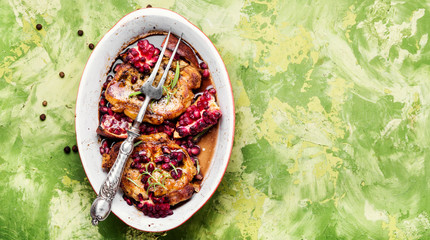 Grilled pork chop in pomegranate sauce