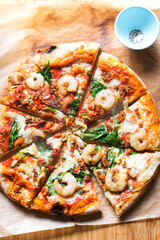 Garlic king prawn wood fired pizza with spinach & red chilli 