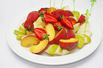 Fruit and berry salad. Strawberries, pears, apples.