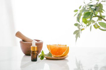 Citrus oil orange natural over bright background